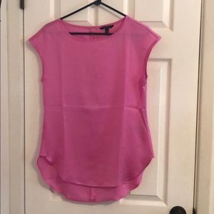 Hot pink silky shirt.